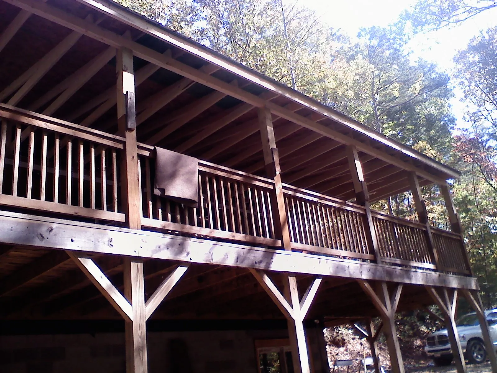 Timber framing under a new elevated porch and deck — Roof Leak Repair in Chelan Falls by Roofing Brothers